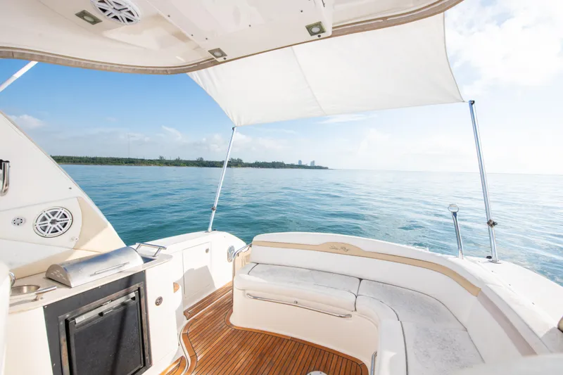 Slide: The Image of View from the deck of a 2009 Sea Ray 350 Sundancer yacht on calm waters. - 38