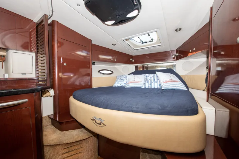 Slide: The Image of Luxurious cabin interior of 2009 Sea Ray 350 Sundancer yacht with cozy bed. - 7