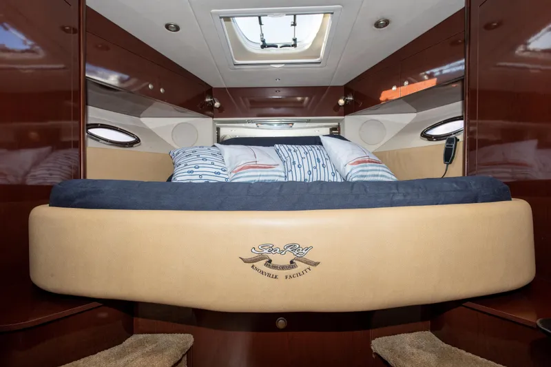Slide: The Image of Luxurious cabin interior of 2009 Sea Ray 350 Sundancer yacht with cozy bed. - 8