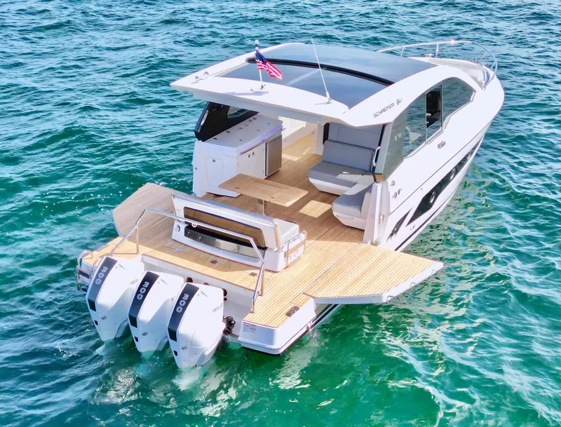 The Image of Schaefer 375 yacht 2025 model cruising on clear blue waters. - 0