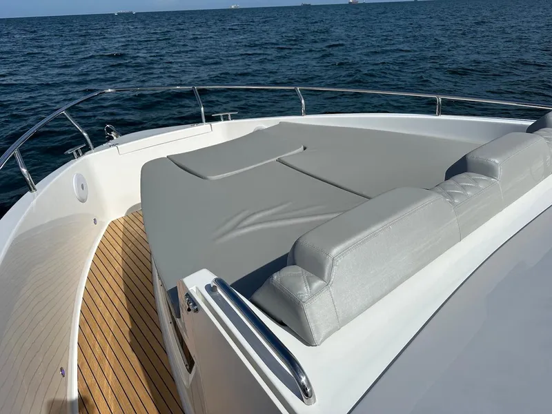 Slide: The Image of Luxury Schaefer 375 yacht 2025 model with sun deck on open sea. - 16