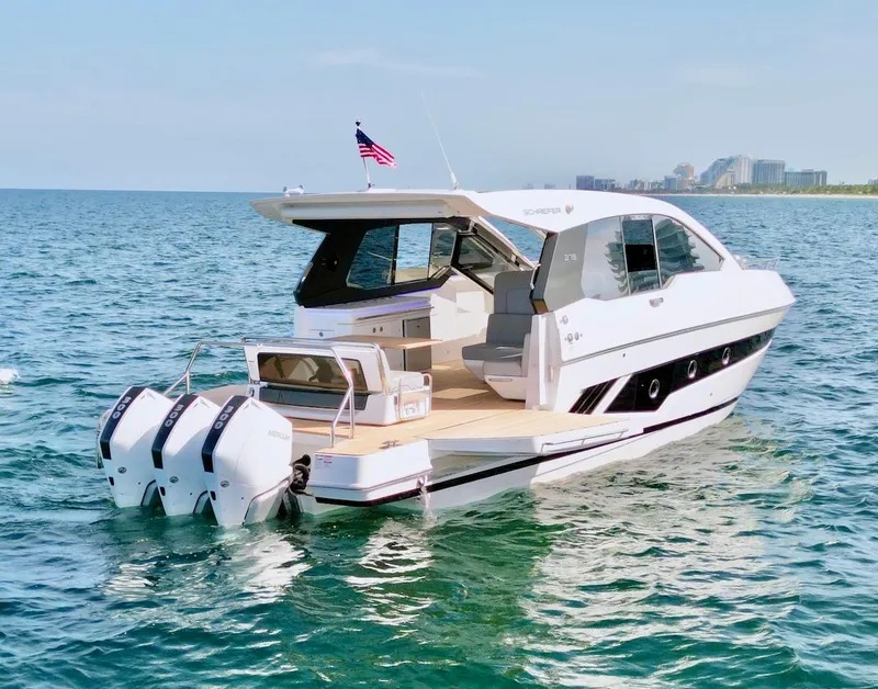 Slide: The Image of Luxury Schaefer 375 yacht, 2025 model, cruising on open water. - 2