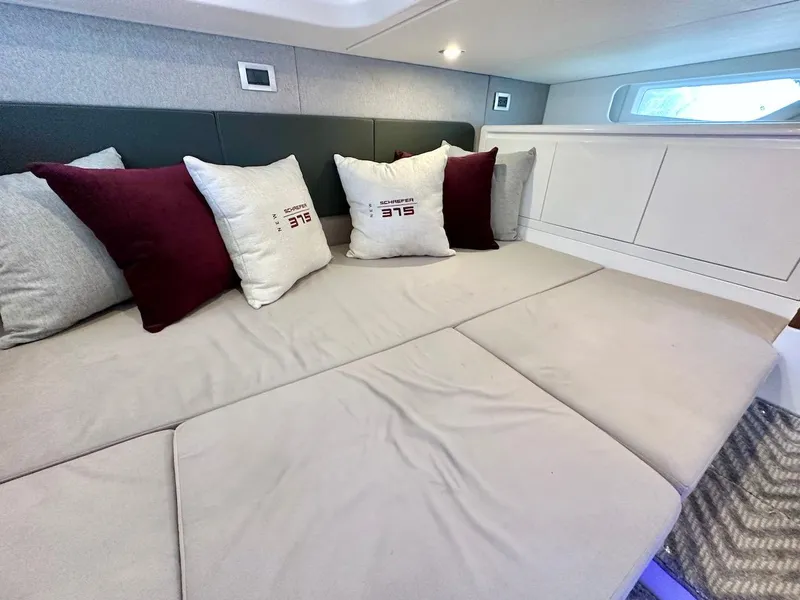 Slide: The Image of Luxurious interior of 2025 Schaefer 375 yacht with plush cushions and modern design. - 35
