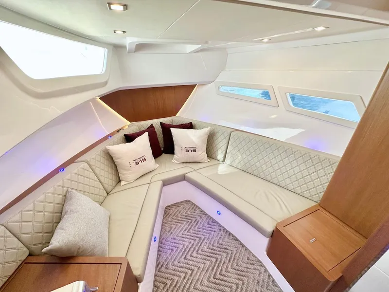 Slide: The Image of Luxurious interior of 2025 Schaefer 375 yacht with plush seating and modern design. - 26