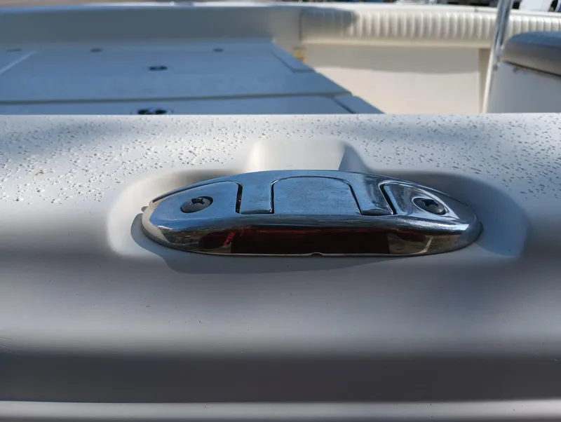 Slide: The Image of Close-up of a 2014 Carolina Skiff Sea Skiff 21 boat cleat. - 11