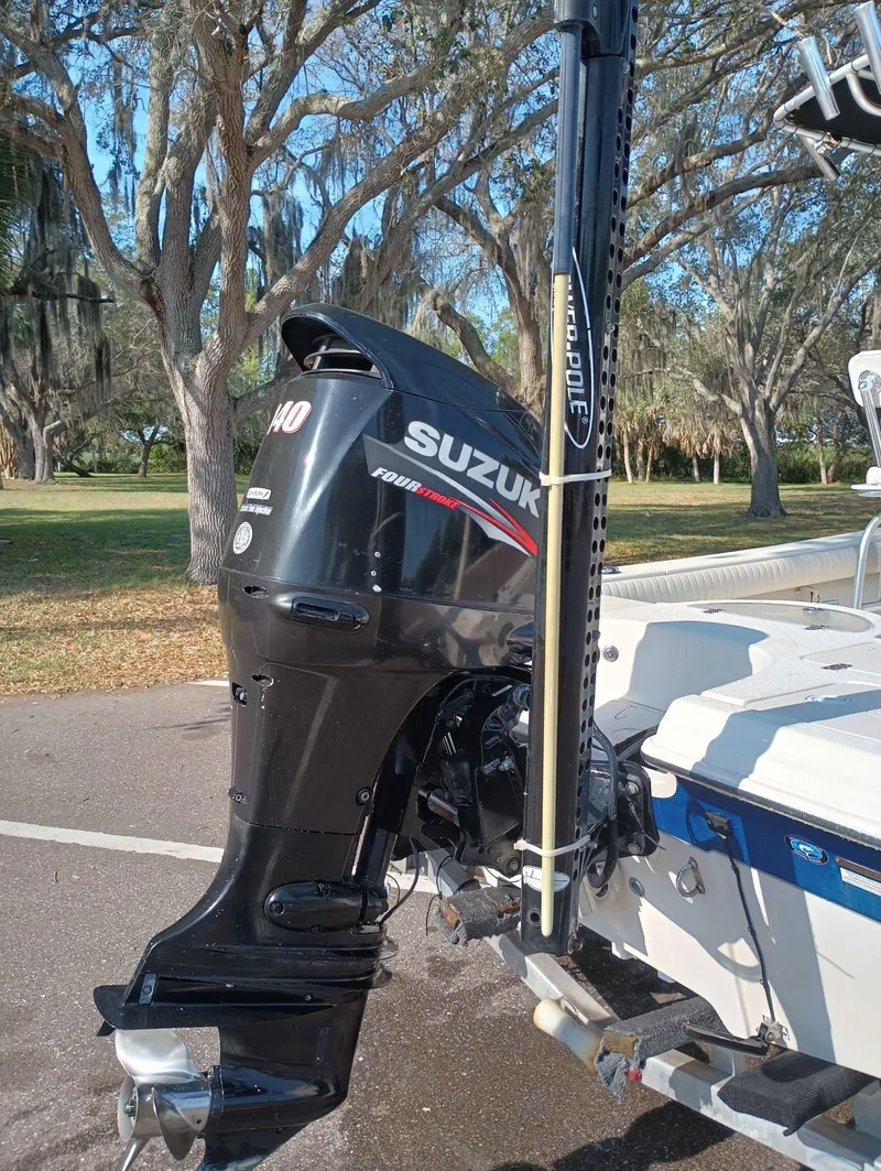 Slide: The Image of 2014 Carolina Skiff Sea Skiff 21 with Suzuki 140 outboard motor. - 19