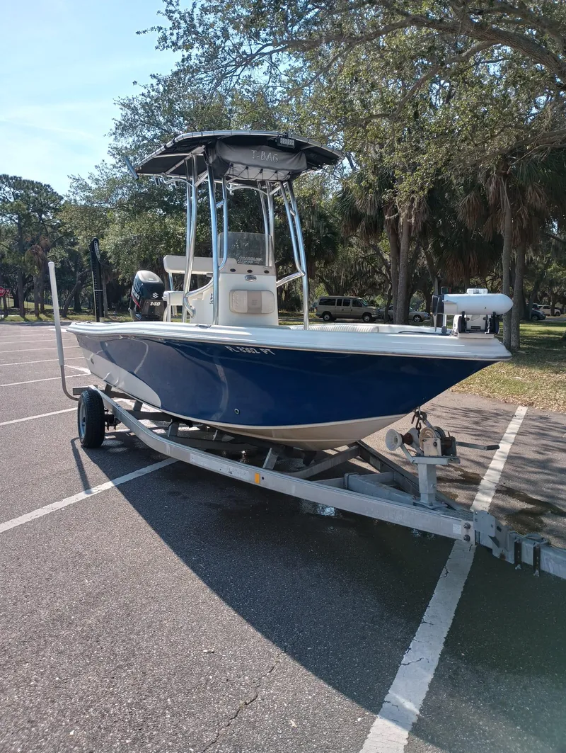 Slide: The Image of 2014 Carolina Skiff Sea Skiff 21 on trailer in parking lot. - 2