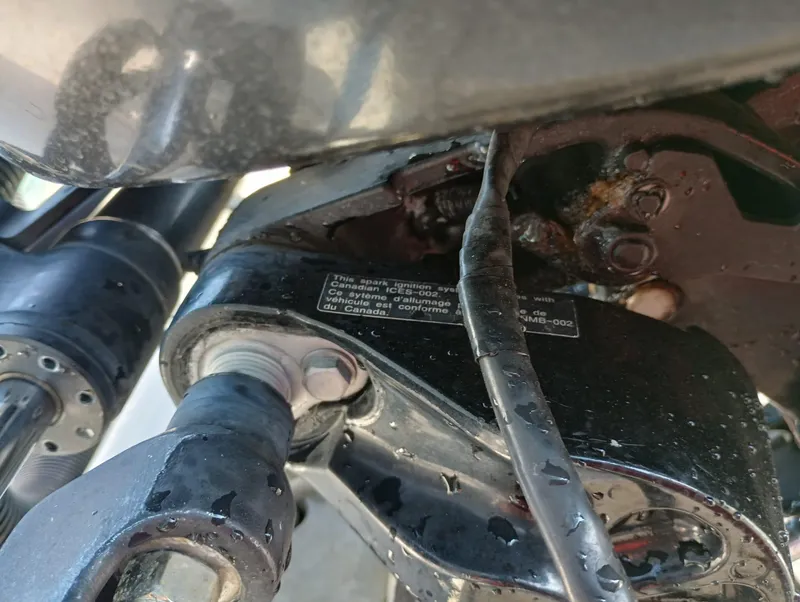 Slide: The Image of Close-up of the engine components of a 2014 Carolina Skiff Sea Skiff 21 boat. - 32