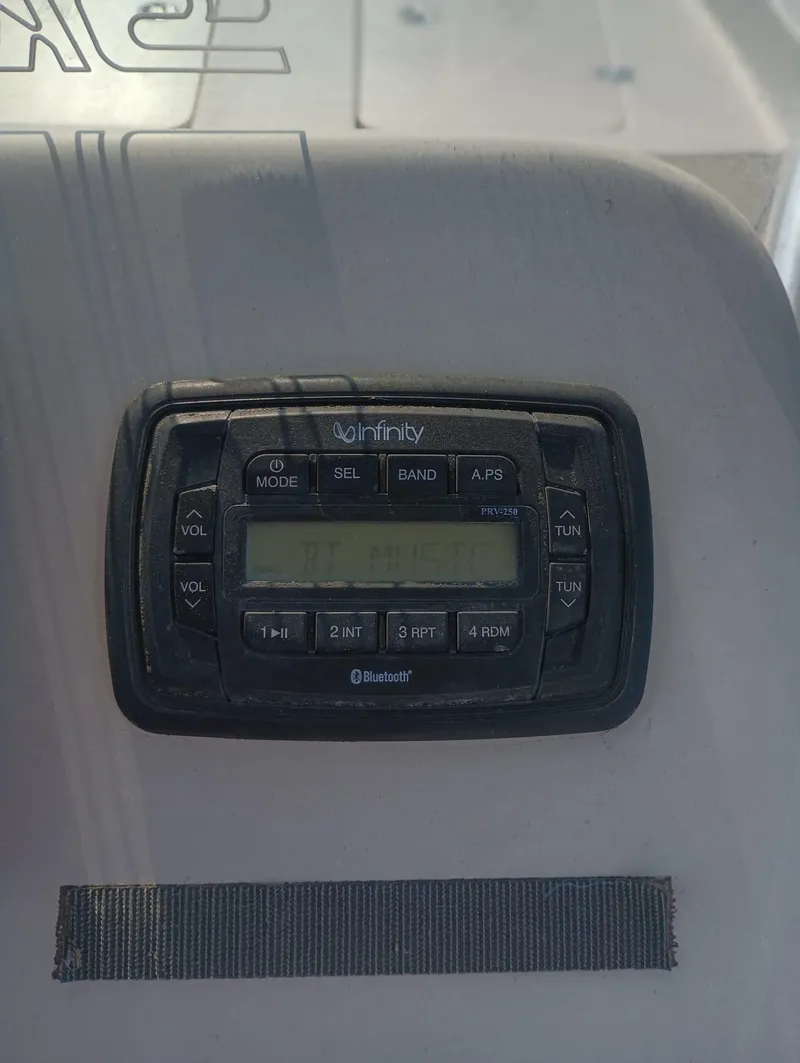 Slide: The Image of 2014 Carolina Skiff Sea Skiff 21 boat dashboard with Infinity stereo system. - 37