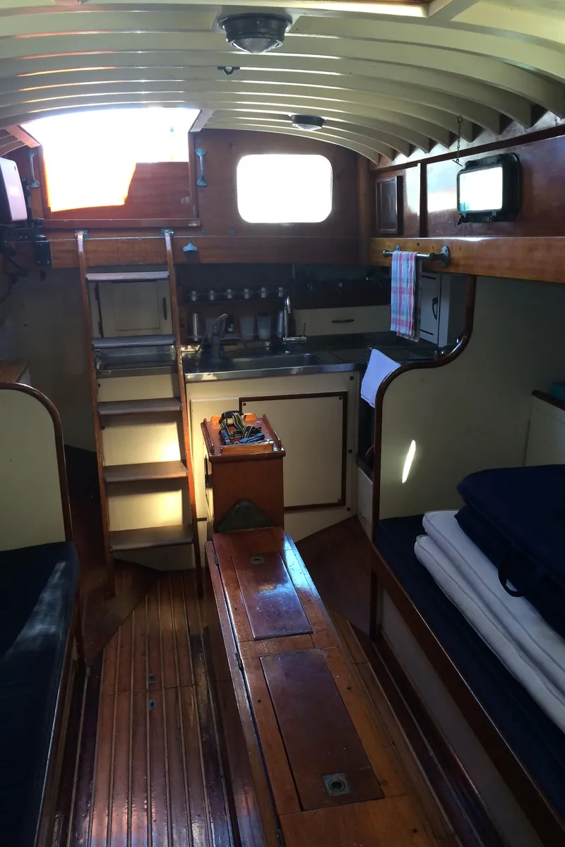 Slide: The Image of 1958 Sparkman & Stephens Nevins 40 yacht interior with navigation equipment and wooden finish. - 22