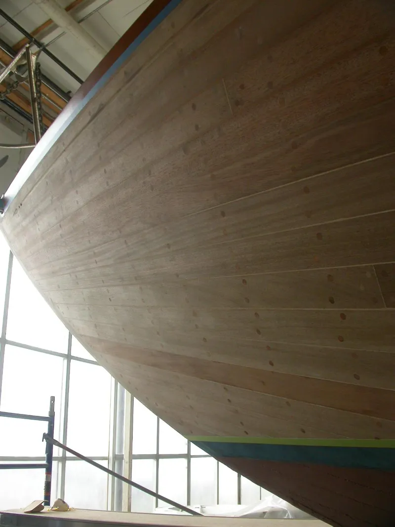 Slide: The Image of 1958 Sparkman & Stephens Nevins 40 wooden hull in a workshop setting. - 32