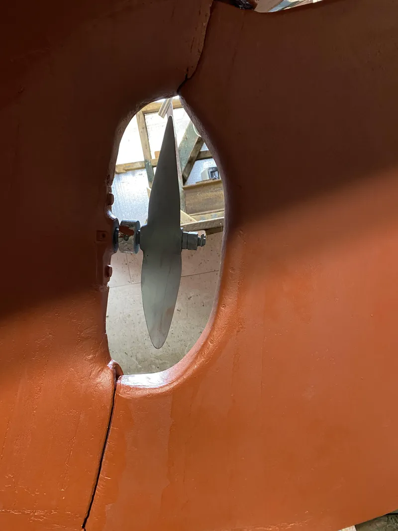 Slide: The Image of 1958 Sparkman & Stephens Nevins 40 sailboat on calm water under clear blue sky. - 8