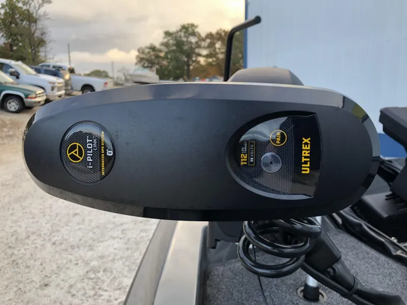 Slide: The Image of iKon LX20 2024 model with Ultrex i-Pilot trolling motor on a boat. - 8