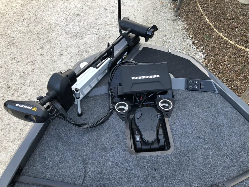 Slide: The Image of 2024 iKon LX20 boat with Humminbird fish finder and Minn Kota trolling motor. - 9