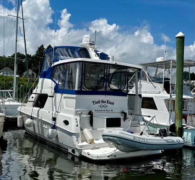 Slide: The Image of 2000 Silverton 392 Motor Yacht Tied the Knot docked in Greenwich Bay, RI. - 2
