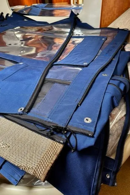 Slide: The Image of Blue canvas covers with zippers for a 2000 Silverton 392 Motor Yacht. - 34