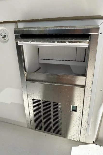 Slide: The Image of Stainless steel refrigerator on a 2000 Silverton 392 Motor Yacht. - 38
