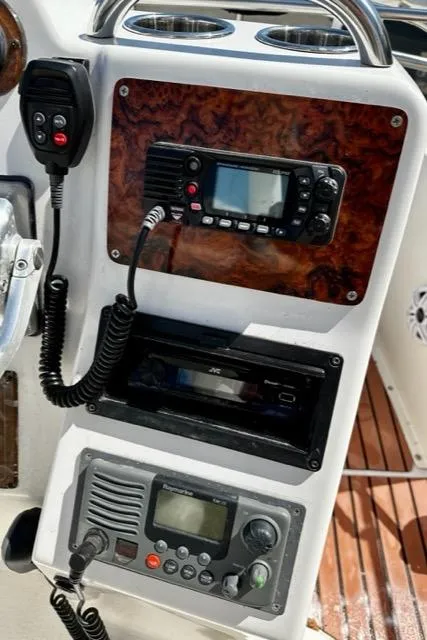 Slide: The Image of Control panel of a 2000 Silverton 392 Motor Yacht with communication devices. - 40