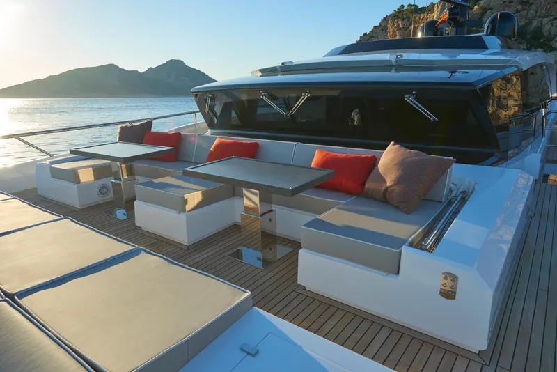 Slide: The Image of Luxurious outdoor seating on 2023 Astondoa 110 Century yacht with scenic ocean view. - 10
