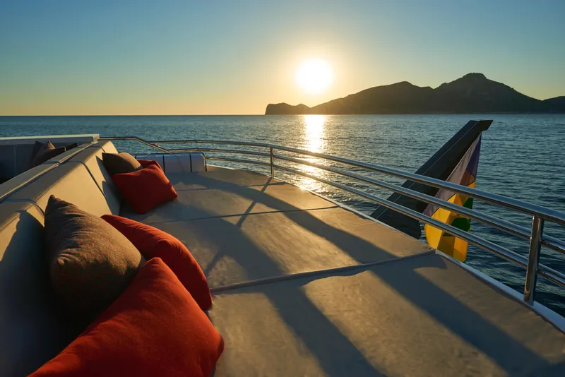 Slide: The Image of Luxury Astondoa 110 Century yacht at sunset, 2023 model, with scenic ocean view. - 21