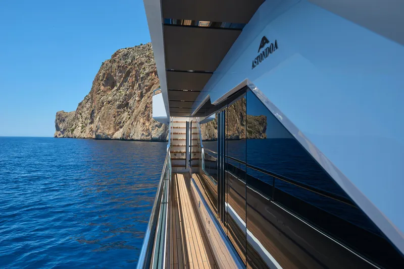 Slide: The Image of Astondoa 110 Century 2023 yacht with ocean view and rocky cliff background. - 22