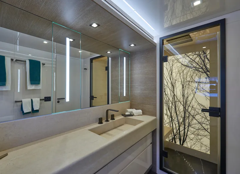 Slide: The Image of Modern bathroom in 2023 Astondoa 110 Century yacht with sleek fixtures and large mirror. - 28