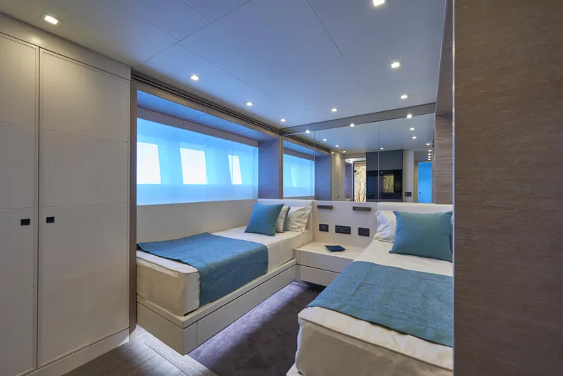 Slide: The Image of Luxurious twin bedroom on the 2023 Astondoa 110 Century yacht. - 42