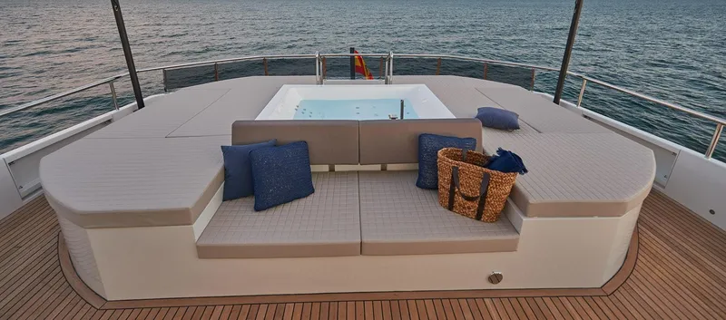 Slide: The Image of Luxury deck of 2023 Astondoa 100 Century yacht with hot tub and seating. - 18