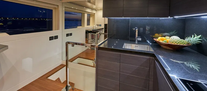 Slide: The Image of Modern kitchen interior on 2023 Astondoa 100 Century yacht with sleek design and ocean view. - 32