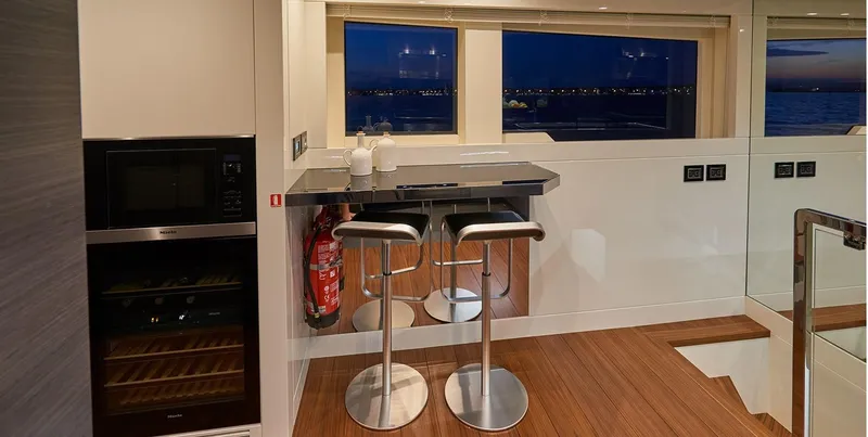 Slide: The Image of Modern kitchen area on the 2023 Astondoa 100 Century yacht with ocean view. - 34