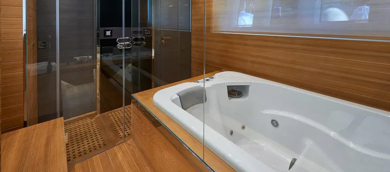 Slide: The Image of Luxurious bathroom on the 2023 Astondoa 100 Century yacht with a modern bathtub. - 45