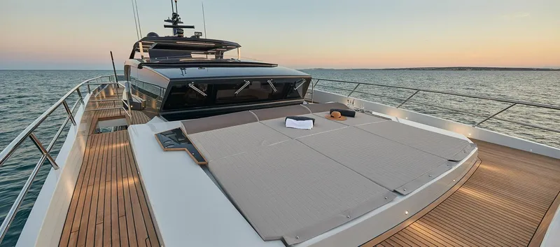 Slide: The Image of Luxury 2023 Astondoa 100 Century yacht deck at sunset. - 8