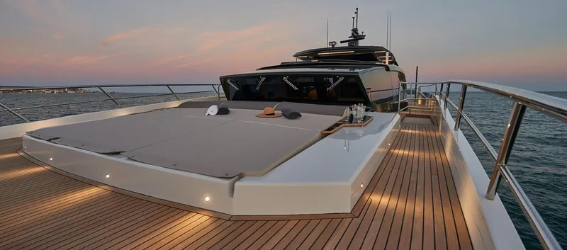 Slide: The Image of Astondoa 100 Century 2023 luxury yacht deck at sunset. - 9