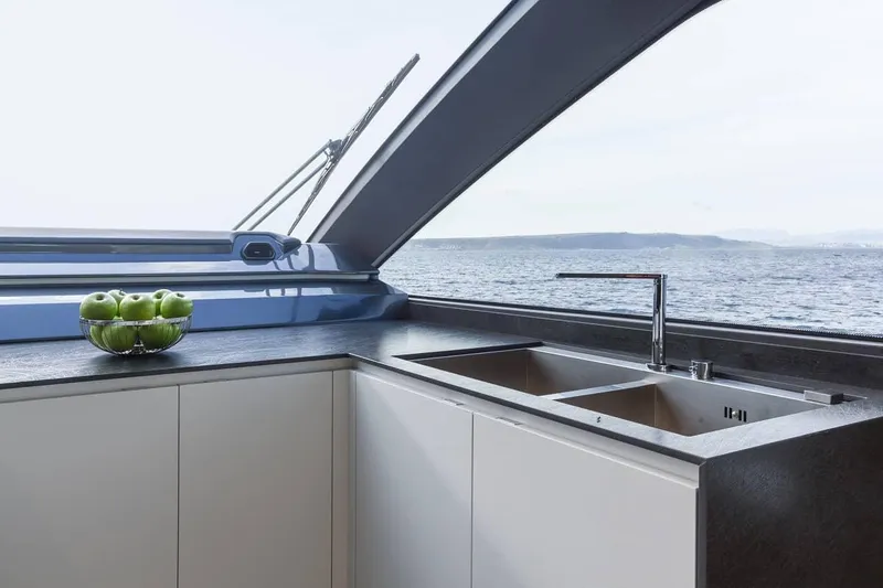 Slide: The Image of Modern kitchen on 2023 Astondoa AS8 Flybridge yacht with ocean view. - 24