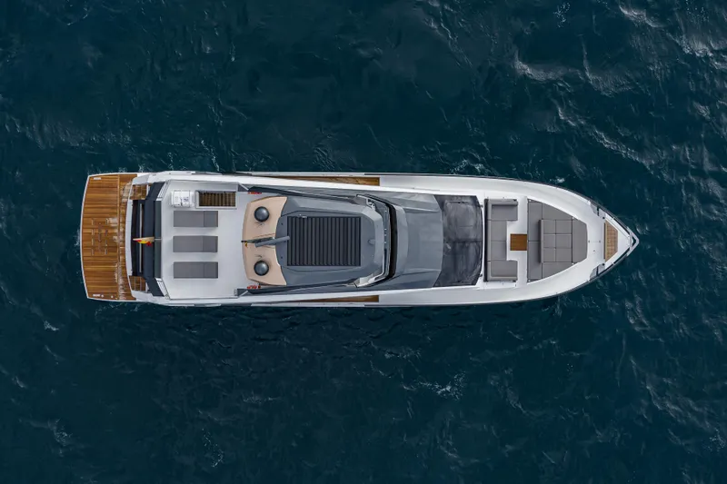 Slide: The Image of 2023 Astondoa AS8 Flybridge yacht, aerial view over deep blue ocean. - 4