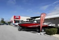 Slide: The Image of 2017 Yamaha GP1800 boat displayed outside a dealership. - 16