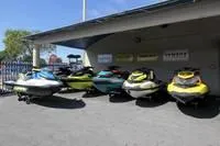 Slide: The Image of 2017 Yamaha GP1800 jet skis lined up under a shelter - 17