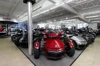 Slide: The Image of Showroom displaying 2017 Yamaha GP1800 boats and various motorcycles. - 23