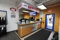 Slide: The Image of Service center reception area with counter, signage, and waiting area. Yamaha Boats GP1800, 2017 model. - 25