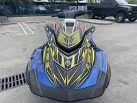 Slide: The Image of 2017 Yamaha GP1800 jet ski in a parking lot. - 4