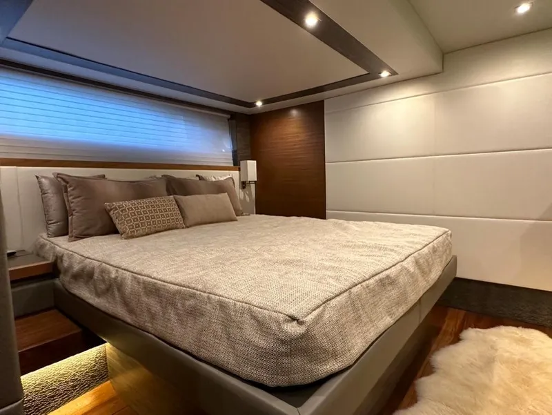 Slide: The Image of Luxurious bedroom interior of 2019 Tiara Yachts C53 with modern design and ambient lighting. - 24