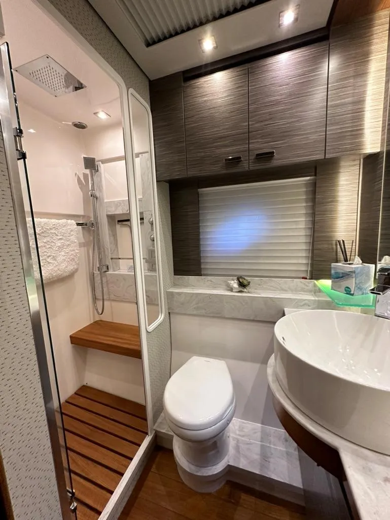 Slide: The Image of 2019 Tiara Yachts C53 bathroom with modern fixtures and shower. - 27