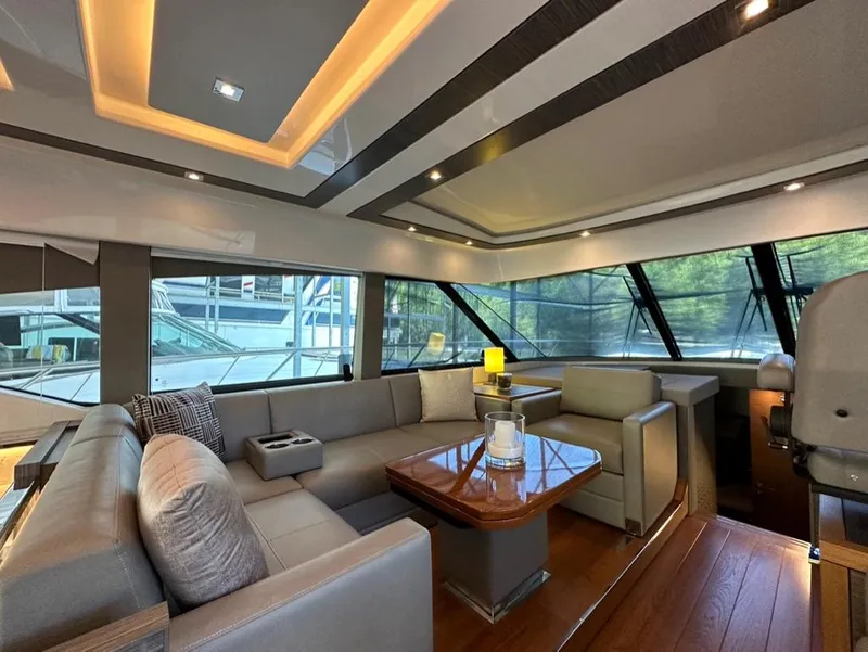 Slide: The Image of Luxurious interior of 2019 Tiara Yachts C53 with modern seating and elegant lighting. - 15