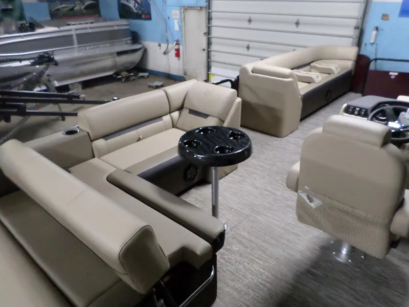Slide: The Image of Interior of 2023 Godfrey Sweetwater 2486SFL pontoon boat with beige seating. - 4