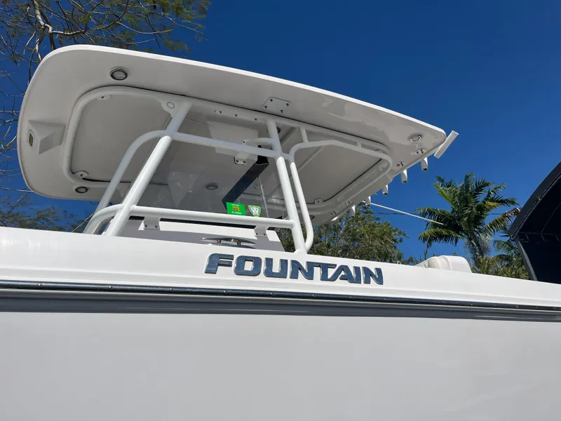 Slide: The Image of 2018 Fountain 34 CC boat under clear blue sky. - 16