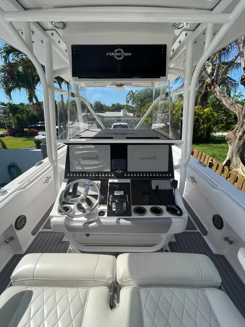Slide: The Image of 2018 Fountain 34 CC boat cockpit with Garmin navigation system. - 4