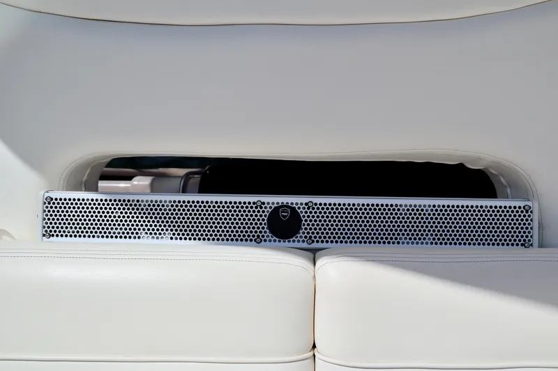 Slide: The Image of Speaker system on a 2001 Sea Ray 460 Sundancer yacht, integrated into white seating. - 41