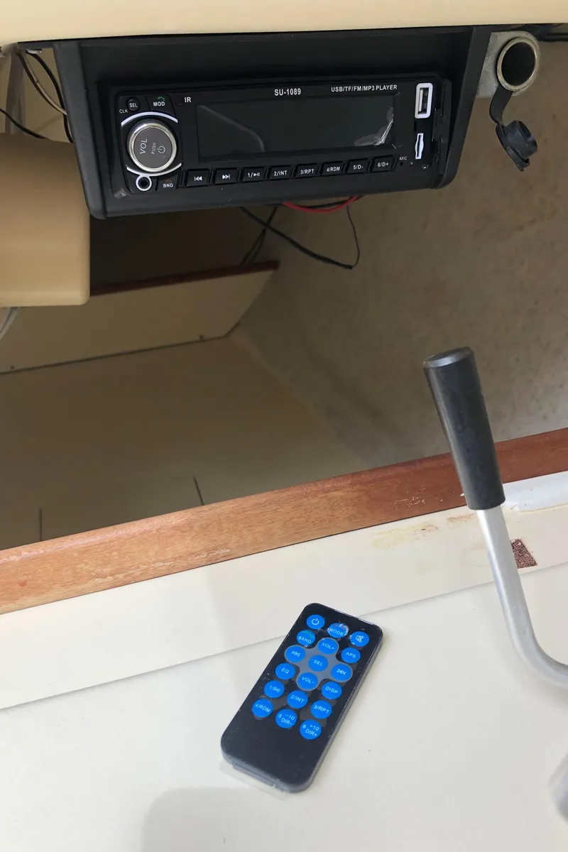 Slide: The Image of Boat interior with stereo system and remote, Hunter 240, 1998 model. - 12