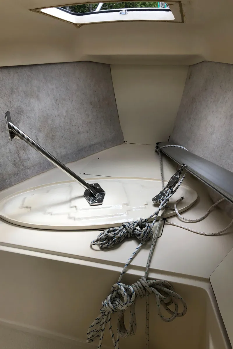 Slide: The Image of Interior of a 1998 Hunter 240 sailboat showing ropes and hatch. - 23