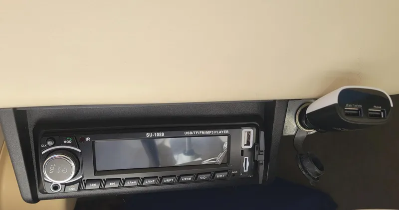 Slide: The Image of Car stereo system with USB ports in a 1998 Hunter 240. - 5